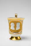 Leonhard Posch, A Berlin KPM porcelain cup with relief portraits of Friedrich Philipp Rosenstiel and his wife