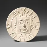 Visage dans un carré by Pablo Picasso, 1956, Round ceramic plate. White clay with relief decor; ceramic, Madoura edition, sold May 2019