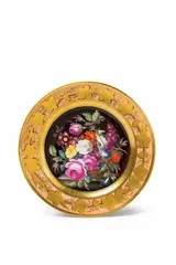 Gottfried Wilhelm Voelcker, A Berlin KPM porcelain plate with a basket of flowers