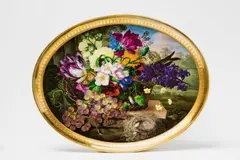 Imperial Manufactory directed by Matthias Niedermayer Vienna, A Vienna porcelain tray with a basket of flowers, grapes, and a bird's nest