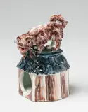 A Meissen porcelain model of a barking dog on its kennel by Meissen Royal Porcelain Manufactory, offered May 2018
