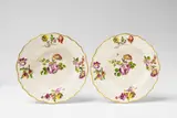 A pair of floral pattern Vienna porcelain soup plates by Imperial Vienna Porcelain Manufactory, sold May 2018