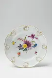 A Meissen porcelain platter with rocaille relief by Meissen Royal Porcelain Manufactory, offered May 2018