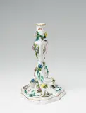A Meissen porcelain candlestick with floral appliques by Meissen Royal Porcelain Manufactory, offered May 2018