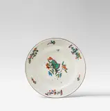A Meissen porcelain dinner plate with butterfly decor by Meissen Royal Porcelain Manufactory, offered May 2018
