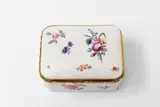 A German porcelain snuff box by Kurmainzische Manufaktur Höchst, Rectangular box with gilt copper mountings, the domed lid decorated with a courtly couple fishing. Unmarked, sold May 2018