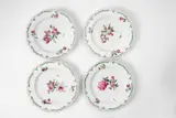 Four Berlin KPM porcelain dessert plates with tri-coloured flowers by Königliche Porzellanmanufaktur Berlin Kpm, sold Apr 2018