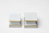 A pair of Berlin KPM porcelain plinths by Königliche Porzellanmanufaktur Berlin Kpm, sold Apr 2018