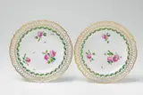 A pair of Berlin KPM porcelain dessert plates with green ribbon decor by Königliche Porzellanmanufaktur Berlin Kpm, sold Apr 2018