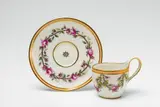 A Berlin KPM porcelain cup and saucer with rose swags by Königliche Porzellanmanufaktur Berlin Kpm, sold Apr 2018