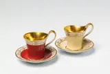 Two Berlin KPM Neoclassical porcelain cups with coloured ground by Königliche Porzellanmanufaktur Berlin Kpm, sold Apr 2018