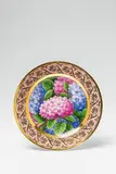 A Berlin KPM porcelain plate with bi-coloured hydrangea flowers by Königliche Porzellanmanufaktur Berlin Kpm, sold Apr 2018