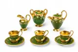 Six items from a Berlin KPM porcelain service with moss-green ground by Königliche Porzellanmanufaktur Berlin Kpm, sold Apr 2018