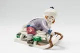 A Berlin KPM porcelain figure of a boy on a sledge by Königliche Porzellanmanufaktur Berlin Kpm, sold Apr 2018