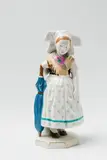 A Berlin KPM porcelain Spreewälder child with an umbrella by Königliche Porzellanmanufaktur Berlin Kpm, offered Apr 2018