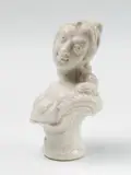A white porcelain cane handle with a ladie's bust by Nymphenburg, offered Nov 2017