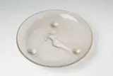 A Lalique pressed glass "coupe trépied Sirène" by René Lalique, offered Nov 2017