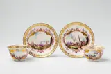 Two Meissen porcelain koppchen and a pair of saucers with merchant navy scenes by Meissen Royal Porcelain Manufactory, offered Nov 2017