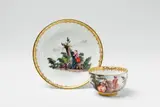 A Meissen porcelain cup and saucer with courting couples by Meissen Royal Porcelain Manufactory, sold Nov 2017