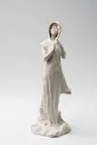 Sèvres, A Sèvres biscuit porcelain figure of a lady in a hat