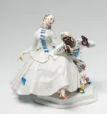 Paul Scheurich, A Meissen porcelain group with a lady and a servant, Blue crossed swords mark with dot to back of base, model no. A1179, pressnummer 42, iron red 74, engraved to base "Scheurich". H