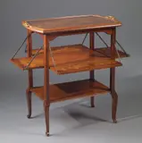 Louis Majorelle, A bronze-mounted Louis Majorelle mahogany and satinwood tea table