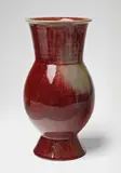 A copper-red feldspar glazed stoneware vase by Steinzeugfabrik und Kunsttöpferei Reinhold Hanke, sold May 2017