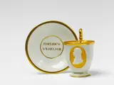 Leonhard Posch, A Berlin KPM porcelain cup and saucer with a portrait of Frederick William III