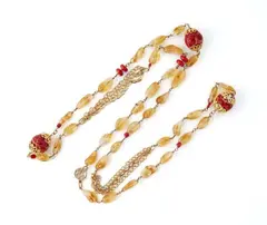 Les Paruriers, A Robert Goossens for Les Paruriers coral sautoir, Paris 1970s, Gold plated metal, quartz, coral-coloured glass. Plaque with LP logo. L