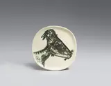 Tête de chèvre de profil by Pablo Picasso, 1950, Ceramic plate. White clay with relief decoration and coloured engobe painting, partially glazed; ceramic, Madoura editio, sold Dec 2016