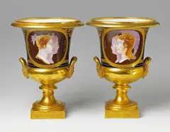 Louis Bertin Parant, A pair of porcelain "Medici" vases with faux cameo decor