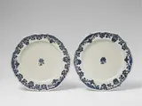 Paul Hannong, Two Strasbourg faience plates "au lambrequin"