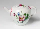 Joseph Hannong, A Strasbourg faience teapot with "fleurs contournées" decor