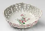 Joseph Hannong, A Strasbourg openwork faience basket with "fleurs contournées" decor, Blue mark "IH 866". Minor soiling due to ash. H 12.1, W