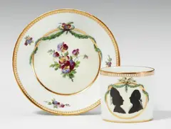 Gottlob Samuel Mohn, A Berlin KPM porcelain cup with silhouetted and floral decor