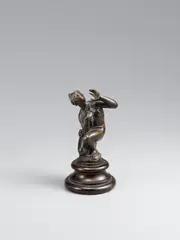 Antonio Susini, A cast bronze figure of a crouching nymph, studio of Antonio Susini