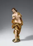 Veit Königer, A carved limewood figure of an angel in prayer, attributed to Veit Königer.