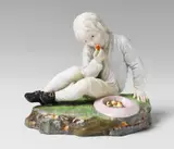 Johann Peter Melchior, A Höchst porcelain figure of a boy eating a pear.
