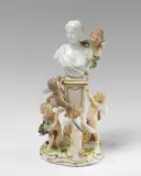 Meissen Royal Porcelain Manufactory, A rare Meissen porcelain model of five putti grouped around a memorial.