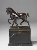 Rudolf Kaesbach, A bronze figure of a man taming a horse on a black marble base., A bronze figure of a man taming a horse on a black marble base. Signed to the back of the plinth: R. KAESBACH BERLIN. H