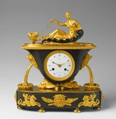 Claude Galle, An époque Empire ormolu pendulum clock formed as Venus in her chariot.