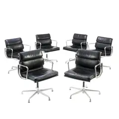 Charles and Ray Eames, SIX 'EA433' SOFT PAD SIDE CHAIRS FOR HERMAN MILLER, Black padded leather over an aluminium and metal frame on universal five star base. Herman Miller mark embossed to frame