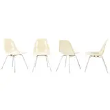 Charles and Ray Eames, FOUR CHAIRS FOR HERMAN MILLER, Parchment coloured fiberglass shells on aluminium legs. Manufacturer logo to underside of seat shell