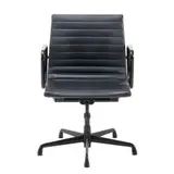 Charles and Ray Eames, 'EA334 GROUP MANAGEMENT' CHAIR FOR HERMAN MILLER, Black powder-coated aluminium frame with ribbed black vinyl upholstery on five star swivel base. Height and tilt adjustable