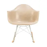 Charles and Ray Eames, 'RAR' CHAIR FOR HERMAN MILLER, Natural moulded fibreglass shell seat on chromed rod base with rubber shock mounts and rocking base. Manufacturer mark impressed to base