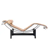 'LC4' CHAISE FOR CASSINA by Le Corbusier, Pierre Jeanneret & Charlotte Perriand, Tan leather with tubular chrome frame and black metal cradle. Cassina mark to base. Manufactured c 1980s, sold Jul 2025