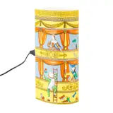 'COMMEDIA ITALIANA' TABLE LAMP FOR ANTONANGELI ILLUMINAZIONE by Piero Fornasetti, sold May 2025