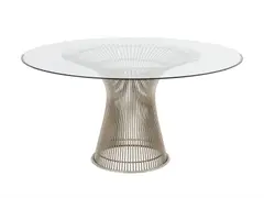DINING TABLE FOR KNOLL by Warren Platner, Curved steel rods welded to a polished nickel finished circular frame. Circular clear glass top with a bevelled edge. Pl, sold Nov 2023