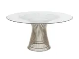 Warren Platner, DINING TABLE FOR KNOLL, Curved steel rods welded to a polished nickel finished circular frame. Circular clear glass top with a bevelled edge. Plastic fittings