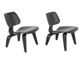 Charles and Ray Eames, A PAIR OF LCW CHAIRS FOR HERMAN MILLER, Black stained moulded plywood with rubber shock mounts. Stamps and stickers present to underside